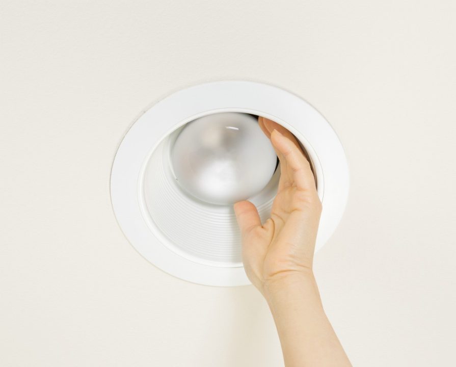 remove Stuck Light Bulb Out of a Recessed Socket with hand